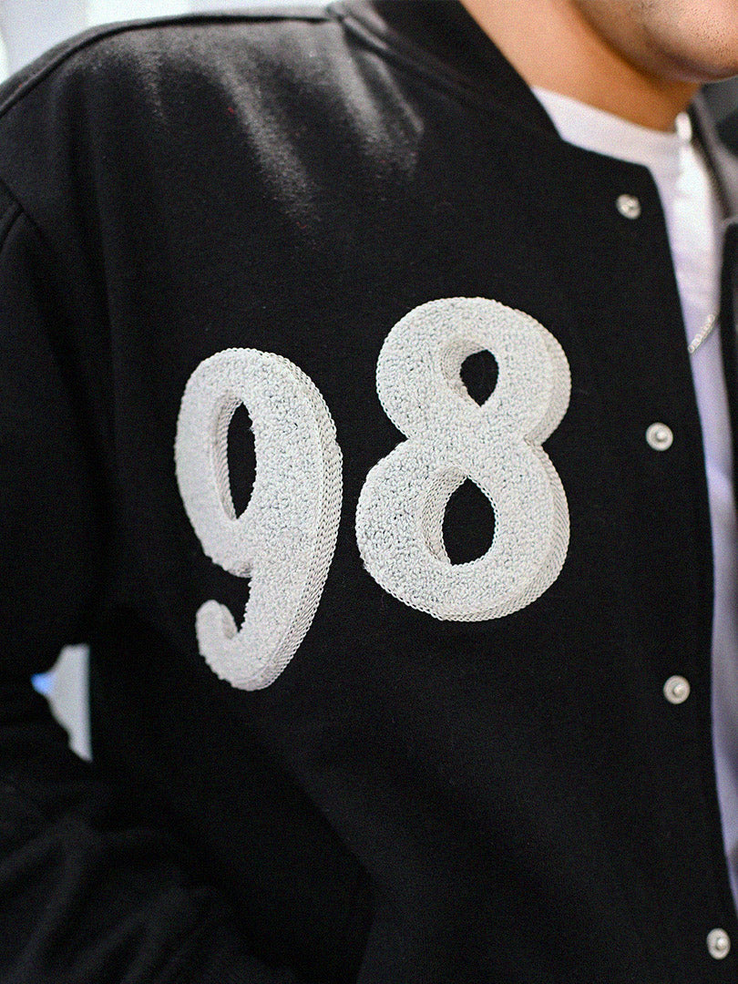 REPRESENT Zaavs Legacy : Unisex Black Varsity Jacket